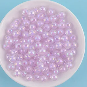 Macro detail of iridescent 8-10mm AB acrylic round beads for DIY handmade jewelry