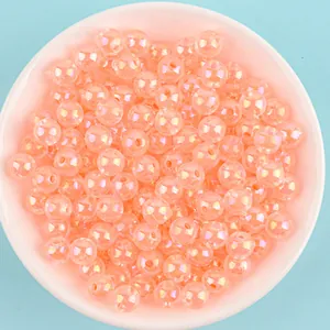 Close-up of peach AB color acrylic beads for DIY handmade jewelry crafts