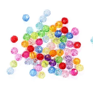 Detailed macro view of various 6-20mm multi-colored acrylic faceted beads for DIY jewelry