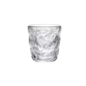 Clear glacier pattern glass cup for water coffee beer and juice on white background