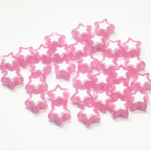 Detailed macro view of pink translucent acrylic star beads for DIY jewelry crafts