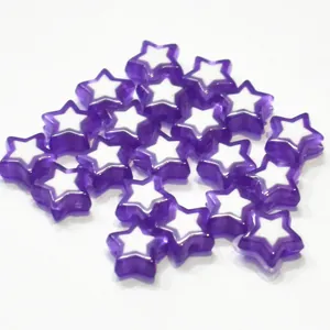 Close-up of purple acrylic star beads with white inner stars for DIY jewelry beading projects