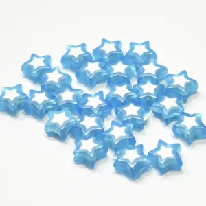 Detailed view of blue and white acrylic star-shaped beads for DIY jewelry making projects.