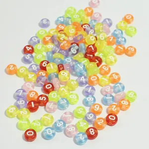 Macro view of colorful 7mm acrylic beads with white printed numbers 0 to 9