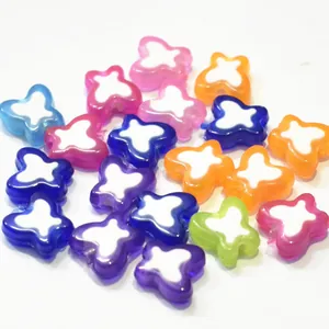 Multi-colored acrylic butterfly beads for DIY children's jewelry making sets.
