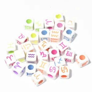 Detailed view of 7mm white acrylic square beads featuring colorful zodiac sign symbols.