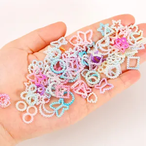 Detailed view of 10-11mm gradient color charms in star, moon, and butterfly shapes