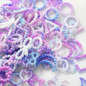 Vibrant gradient 10-11mm pearlescent resin charms in star moon and heart shapes for DIY crafts