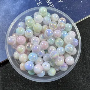 Close-up of iridescent pastel 6-10mm AB coated acrylic round beads for DIY crafts