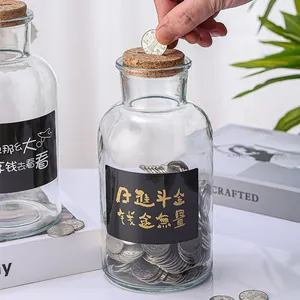 Hucha de cristal grueso transparente con tapón de corcho y pegatina creativa
