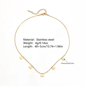 Close-up of gold stainless steel snake chain necklace featuring five heart charms