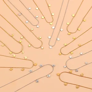 Collection of minimalist stainless steel snake chain necklaces featuring various metal charms
