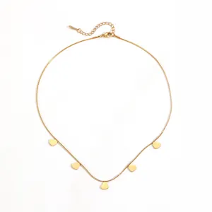 Detailed view of a gold stainless steel snake chain necklace with five heart charms