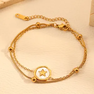 Detailed view of a gold titanium steel double-layer anklet featuring a star pendant