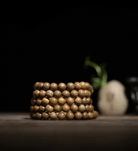 Natural green sandalwood beaded bracelet for women in original untreated brown finish
