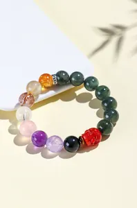 12mm natuurlijke groene rutielkwarts armband met amethist en een rode agaat schedel