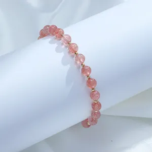 Natural strawberry crystal beaded bracelet with 14K gold filled spacers for women.