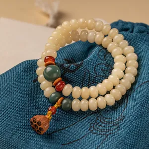 Vintage Chinesischer Stil Perlenarmband Cremegelb Bodhi-Wurzel Holz Doppelschleifen Zen Armband Mit Lotus-Anhänger Schmuck
