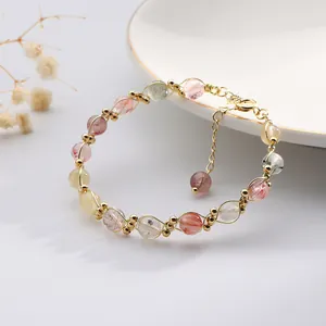 Handmade natural rutilated quartz crystal bracelet with gold-tone wire wrap