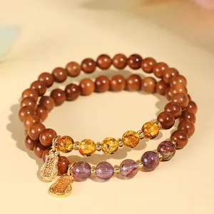 Elegantes Natur-Kuka-Samen-Armband-Set mit Phantom-Kristallperlen und goldenen Glücksanhängern