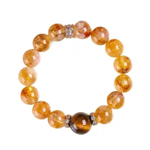Bracelet en quartz jaune naturel avec œil de tigre doré et perles strass.