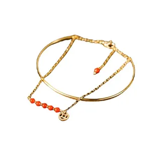 Elegant gold plated double-layer bracelet with red crystal beads and lucky coin charm