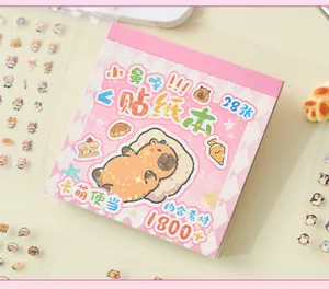 Close-up of cute Capybara sticker book cover with pastel pink design and 1800+ stickers