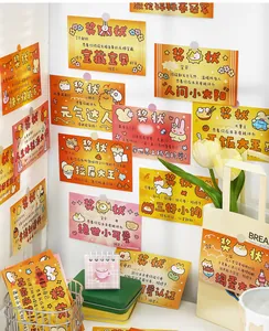 Cute illustrated award-style postcards displayed on wall in warm setting