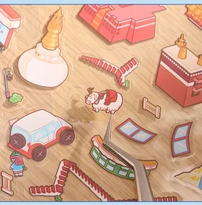 Close-up of 3D layered PET stickers featuring miniature city architecture and animals