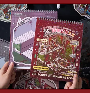 Nahaufnahme eines Miniatur-Szenen-DIY-Stickerbuchs mit dunklen Schlossdetails