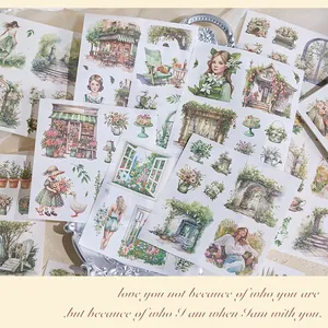 Close-up of watercolor sticker sheets with vintage garden and girl designs