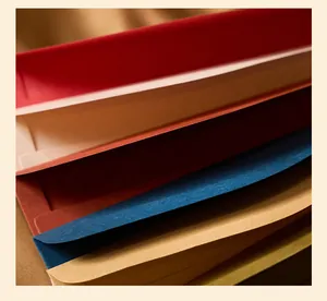 Close-up of premium colorful envelopes showing high-quality paper texture and layered design