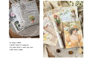 Close-up of vintage style scrapbooking paper with floral and portrait designs