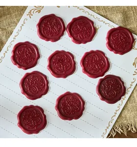 Close-up of vintage burgundy self-adhesive wax seal stickers with embossed For You text