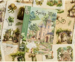 Close-up of watercolor sticker book with floral garden and girl illustrations for DIY