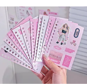 Close-up of pink Korean style sticker book pages for DIY scrapbooking