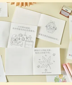 Interior detail of a mini coloring book with cute line drawings and poetic text.