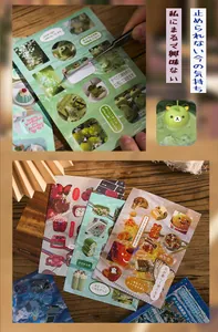 Close-up of vintage die-cut stickers with holographic glitter effect for journaling