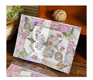 Détail d'une carte papillon 3D laser avec motifs de roses et kit de bricolage fait main