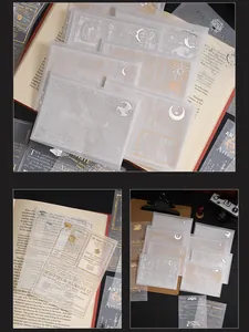 Detailed macro view of translucent tracing paper with elegant hot silver foil moon designs