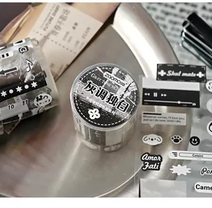 Detailed view of grayscale DIY decorative tape and sticker set for journaling