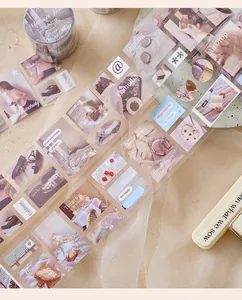 Detailaufnahme von ästhetischem transparentem DIY-Sticker-Tape mit Vintage-Fotos.