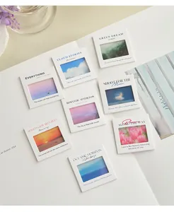 Detail of PET film pendants with artistic nature scenes and poetic English text