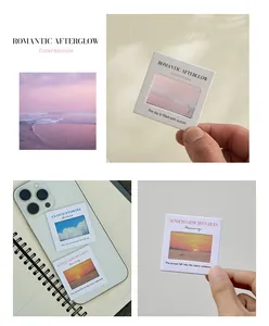 Detailed close-up of PET reversal film pendants featuring sunset and cloud photography.