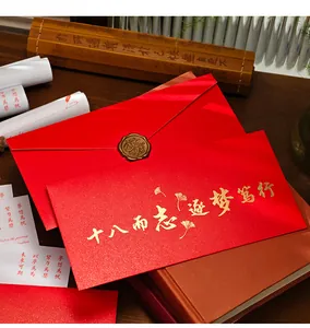 Elegant red graduation invitation card with gold foil calligraphy and wax seal finish