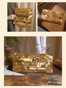Detailed views of traditional Chinese style envelope and letter paper set with artwork