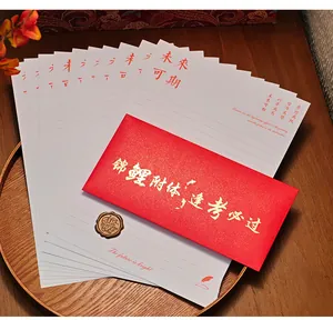 Close-up of inspirational letter set with red envelope and 'Future is Bright' message