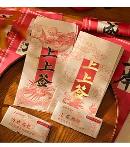Close-up of Chinese style stationery set with dragon pattern and golden calligraphy art