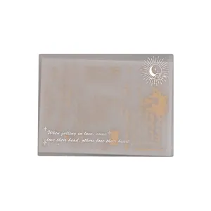 Translucent vellum paper for scrapbooking with silver foiled celestial design and quotes