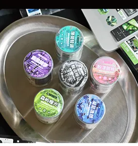 Close-up of 6 decorative washi tape rolls with music player interface design for DIY journaling